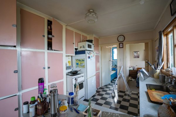 Photo of the old kitchen prior to renovation by Code Construction