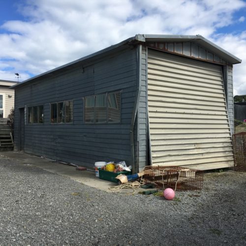 Old garage boat shed ready for demolition. New garage design and build completed by Code Construction Builders Akaroa