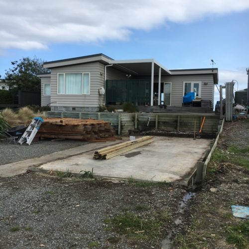 Old garage removed and new garage and boat shed build underway. Includes retaining wall design and build