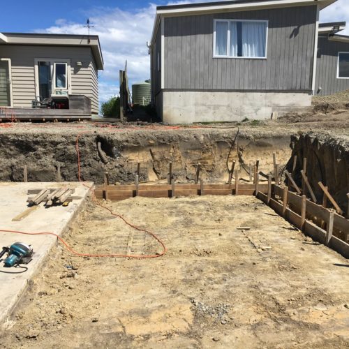 Foundation dug out for new boat shed and garage ready to be built in Akaroa