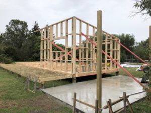 Sealed carport finished and framing underway for new build granny flat. Designed and built by Code Construction, Fernside Rangiora.