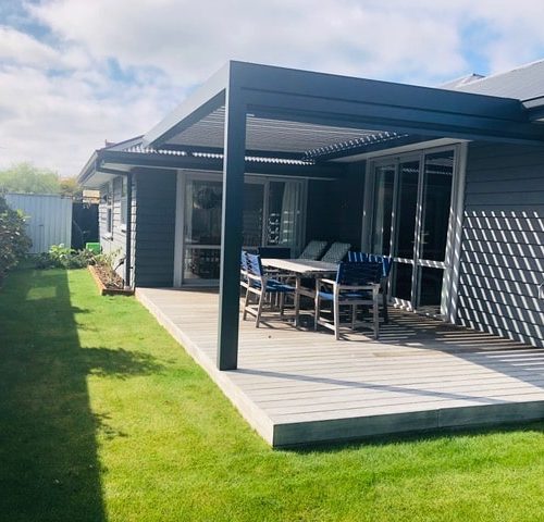 New louvre system and hardwood deck completed as part of a new build in Canterbury by Code Construction