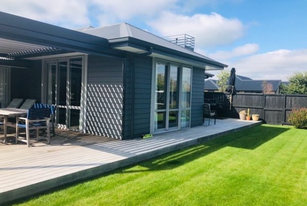 New build designed and built by Code Construction with linear weatherboard, hardwood decks and louvered roof, Christchurch