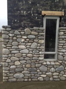 Replacement stone on facade from earthquake damage. EQC repair