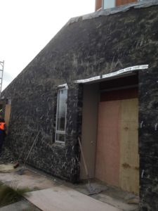 Facade prepared for EQC earthquake stone repair in Canterbury