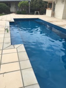 Swimming pool renovation including removing old pool and replacing
