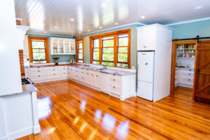 Newly renovated shaker style kitchen with walk in butlers pantry on barn style door