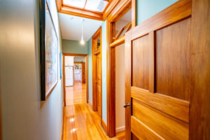 Interior photo of hallway after renovation project in North Canterbury including fresh painting and decorating