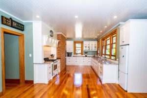 Kitchen renovation project by Code Construction including new ceiling