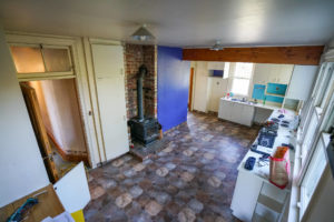 Photo of large retro kitchen before large renovation project