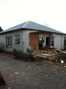 Old weatherboards removed off villa in preparation for renovation and extension