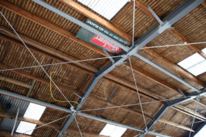 Ceiling of light commercial building prior to renovation by Code Construction