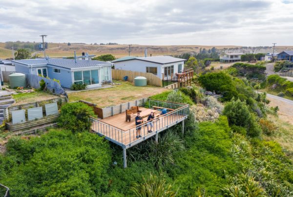 Drone photo of completed job which included two decks and steps, custom made balustrade and louvred roof