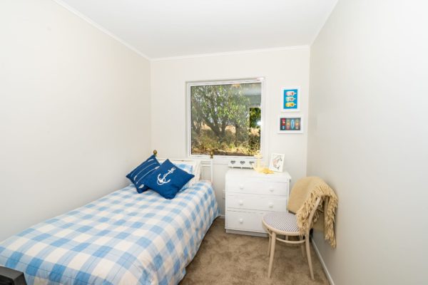 Newly renovated and decorated bedroom by Code Construction. Includes new carpet and double glazed window