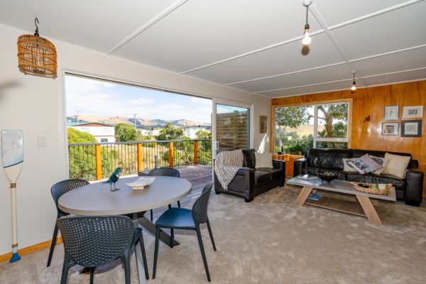 Inside looking out onto new deck built and safety railing by Code Construction Rangiora, North Canterbury