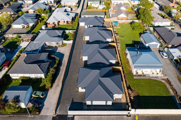 Drone photo of four new houses built by Code Construction in North Canterbury