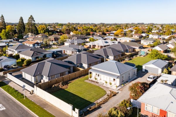 Aerial drone photo of four new build homes by Code Construction