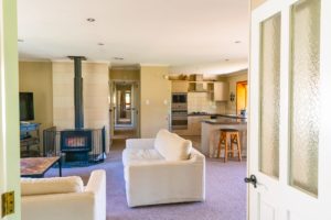 Before photo of renovation project in Fernside Rangiora showing lounge and kitchen area