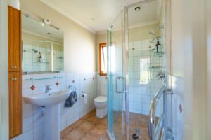 Before photo of existing bathroom before renovation project in Fernside